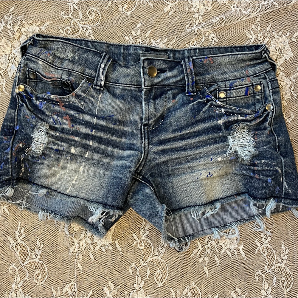 Delia’s Frayed and Paint Splattered Blue Jean Shorts
